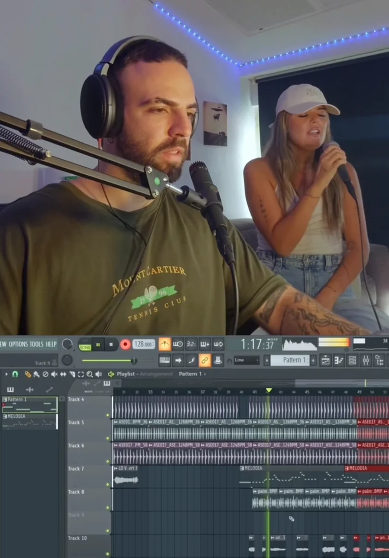 Dani Manzan trabajando con una artista durante una sesión de producción